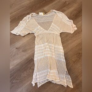 Vitamin A embroidered swim coverup size S 
95% viscose, 3% nylon, 2% polyester